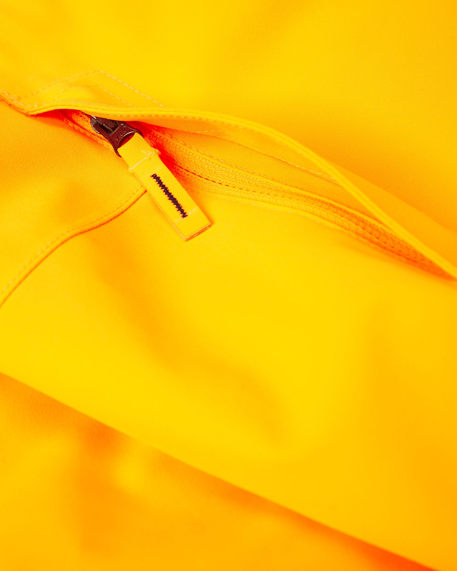 Oranžové lyžařské kalhoty pro chlapce Kjus Vector