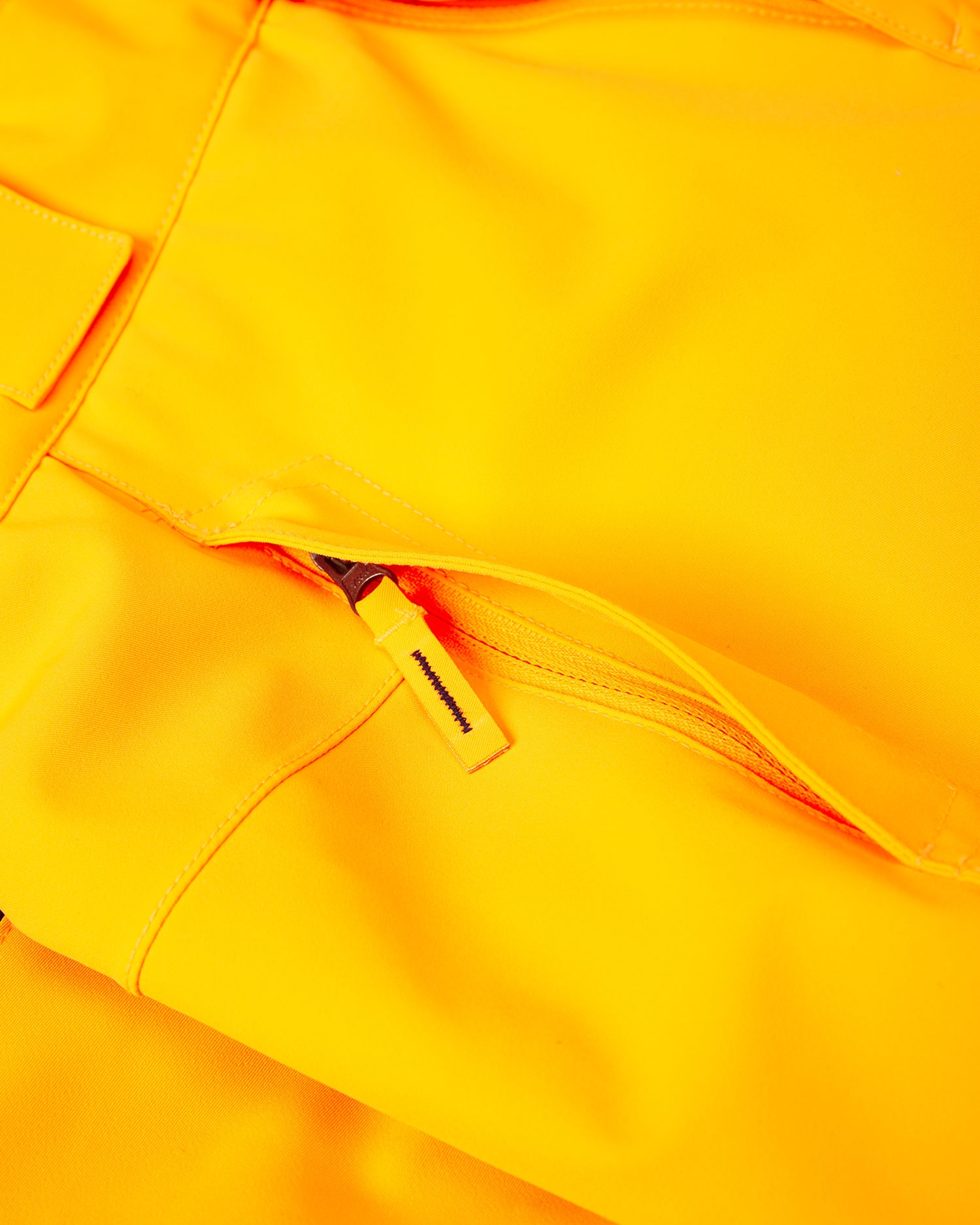 Oranžové lyžařské kalhoty pro chlapce Kjus Vector