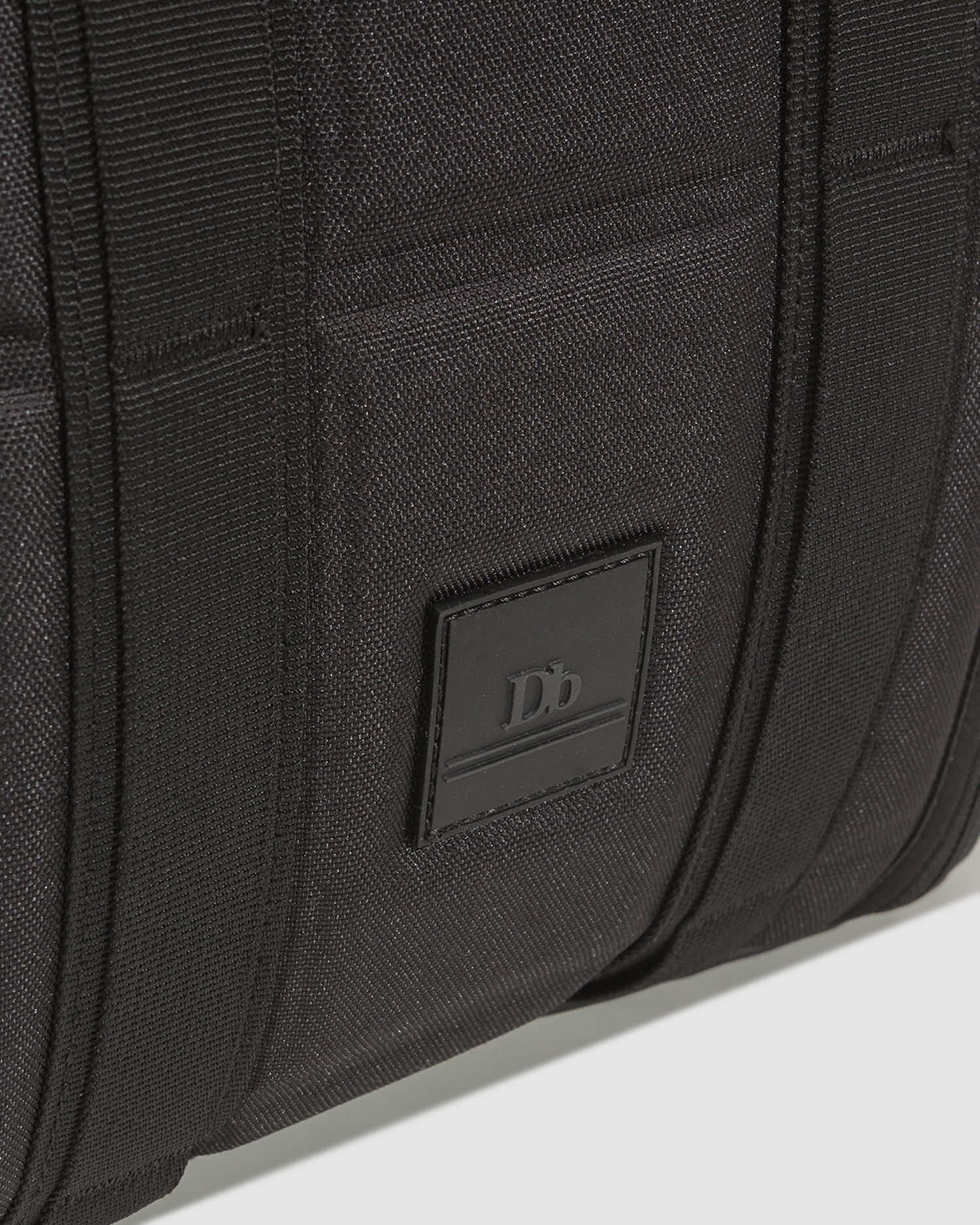 Batoh Db HUGGER BACKPACK 20L