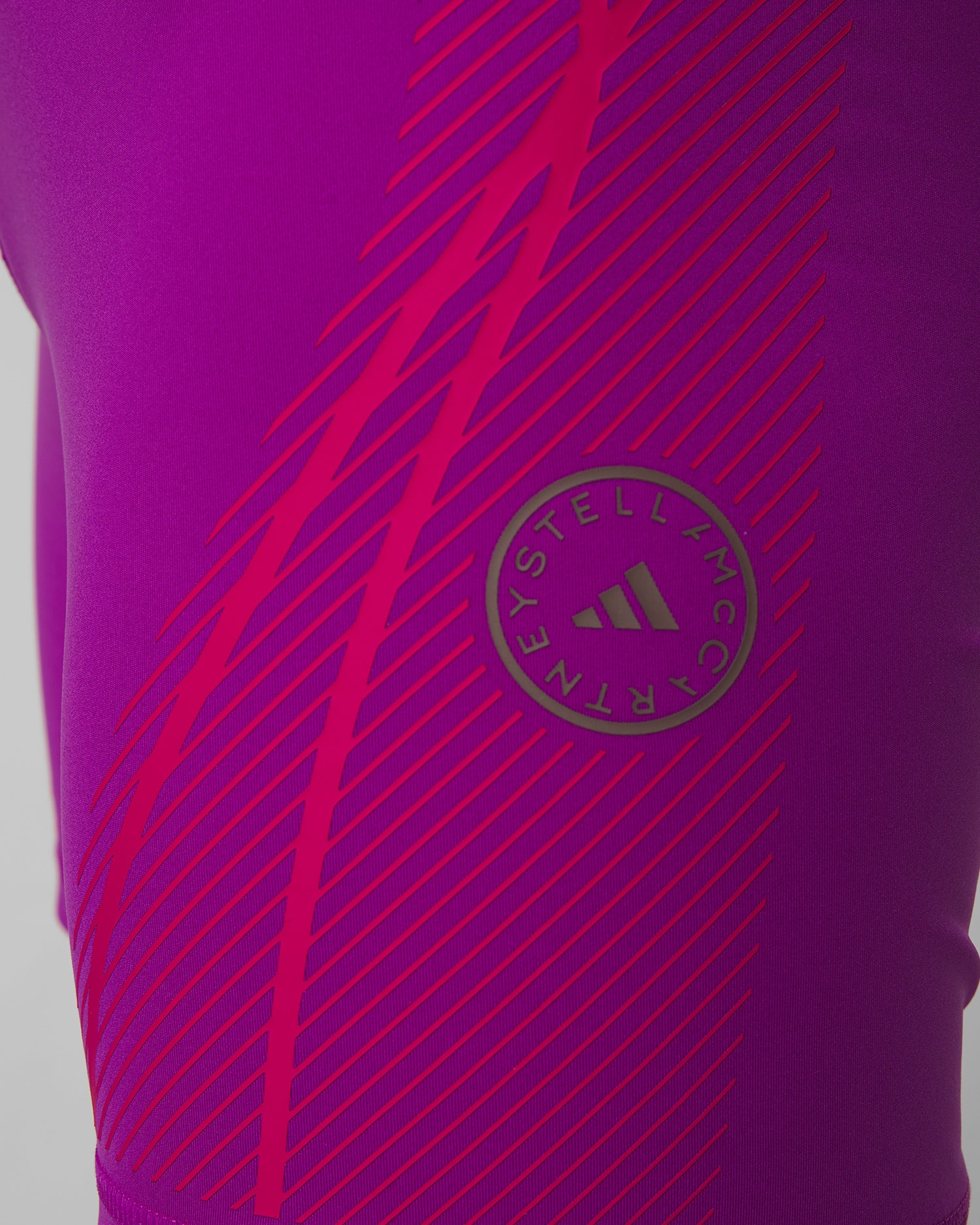 Fialové dámské legíny značky Adidas by Stella McCartney ASMC Truepace