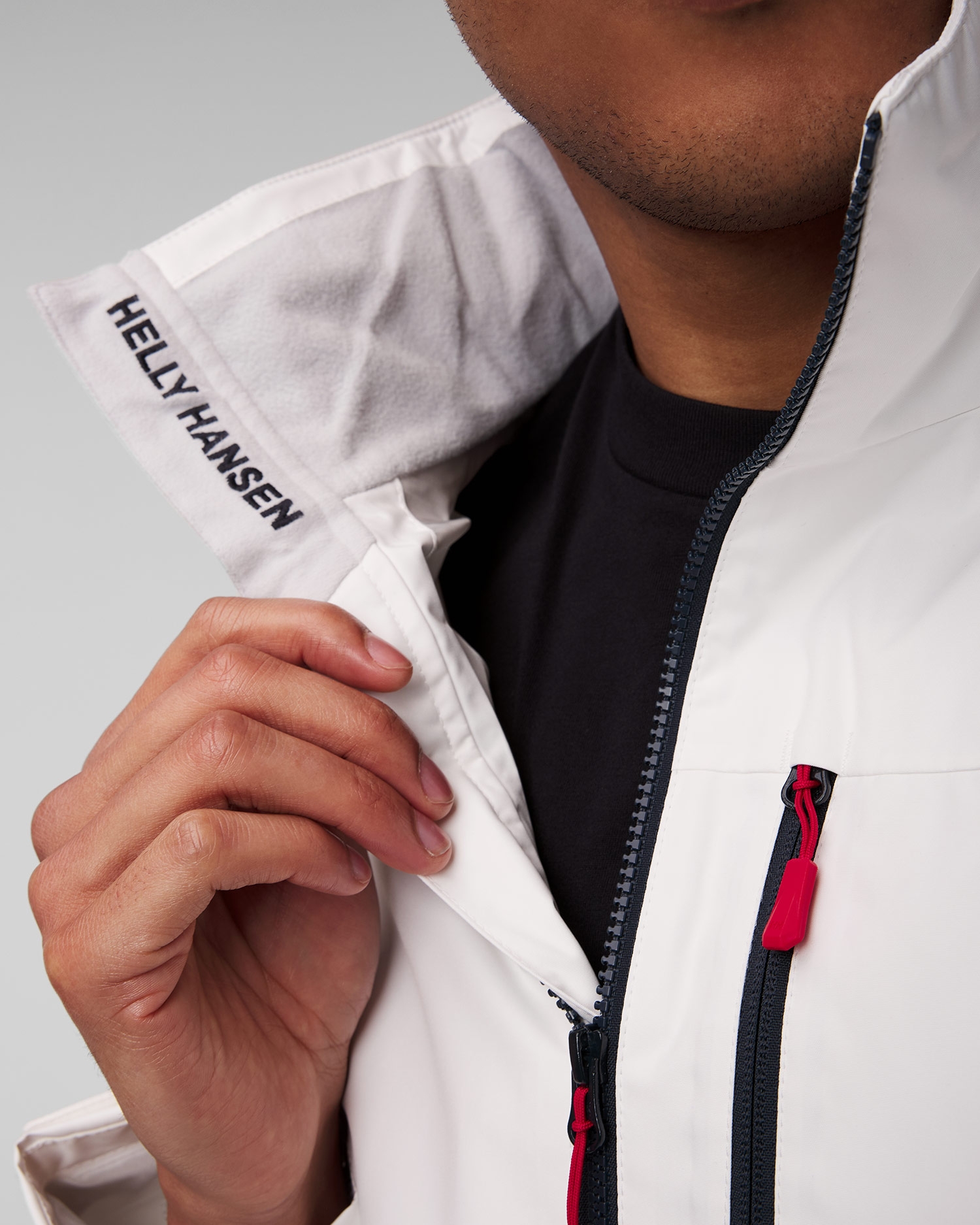 Bílá pánská jachtařská bunda Helly Hansen Crew Hooded Jacket 2.0