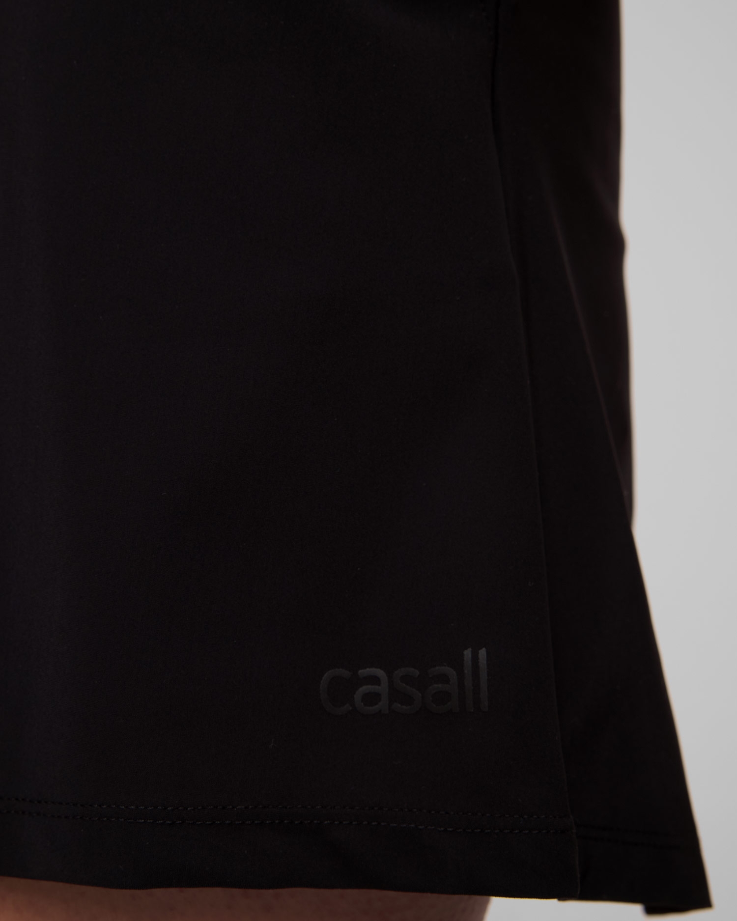 Černý dámský overal Casall Weekend Playsuit