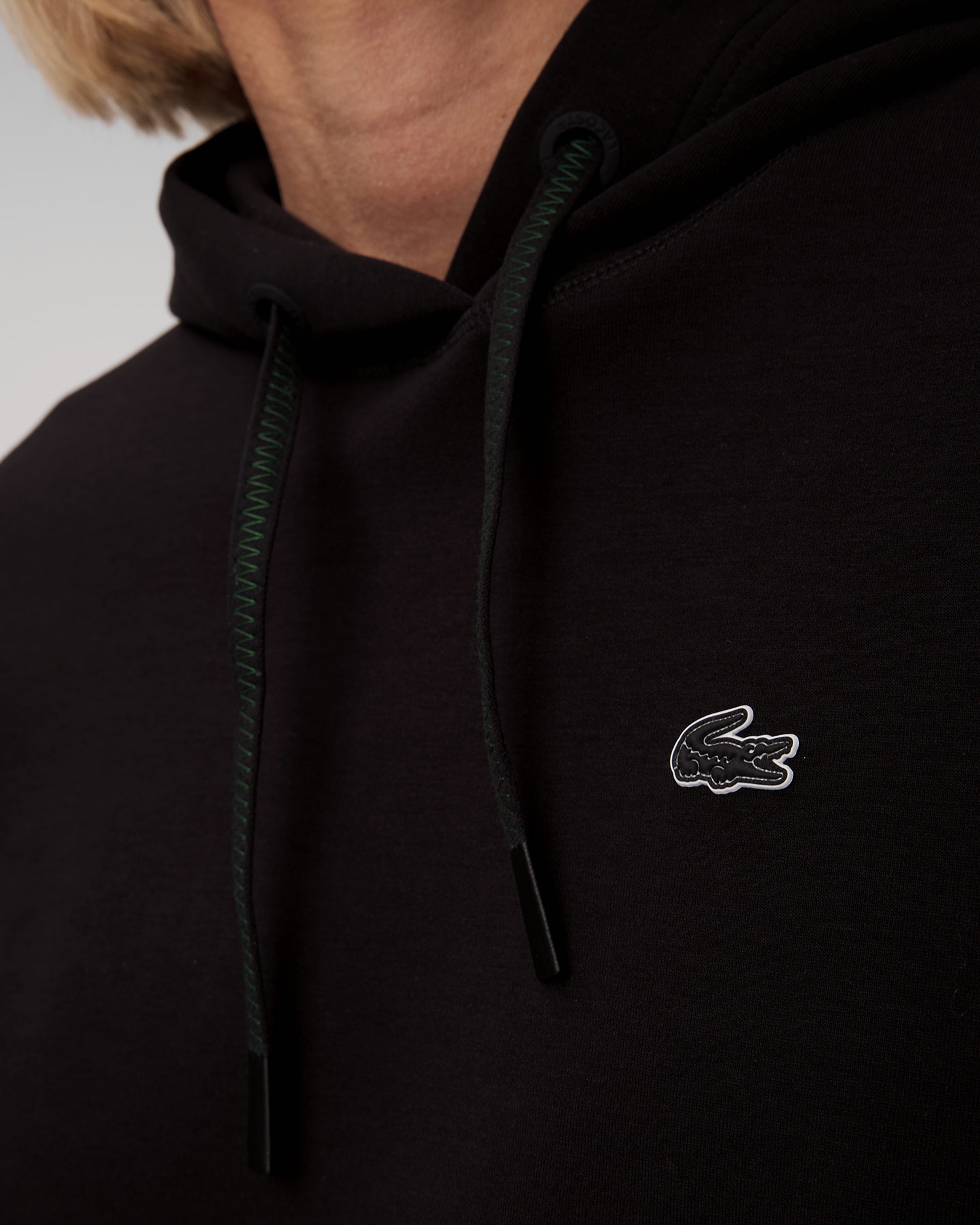 Černá krátká dámská mikina s kapucou Lacoste SF0281