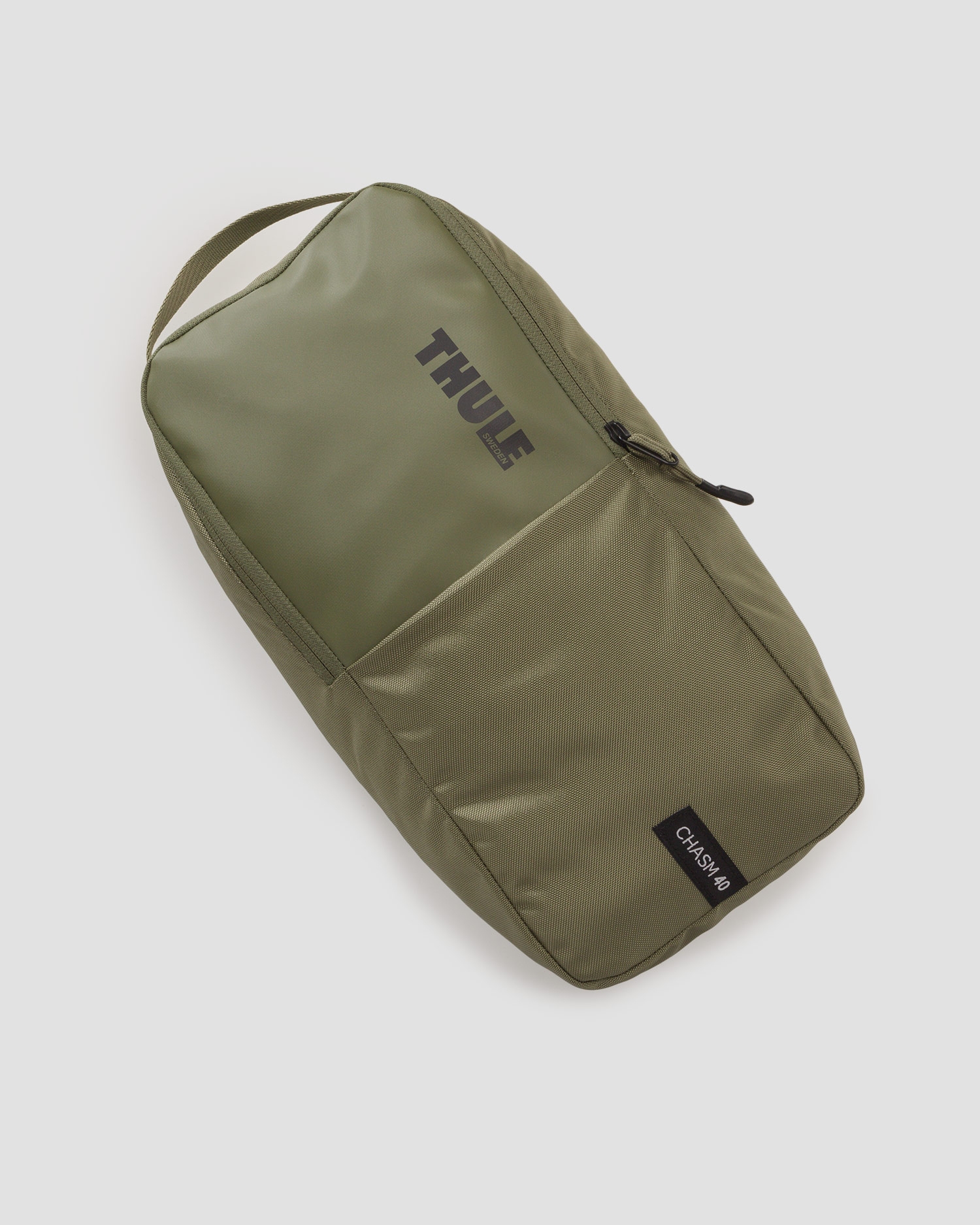 Zelené cestovní zavazadlo s funkcí 2 v 1 Thule Chasm Duffel Bag 40L 