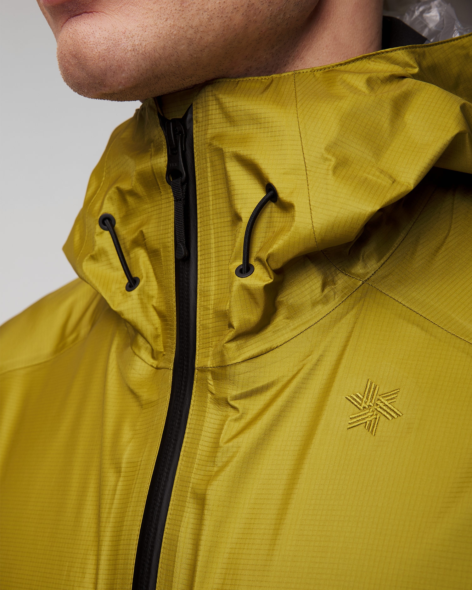 Žlutá pánská membránová bunda Goldwin GORE-TEX 3L Aqua Tect Jacket